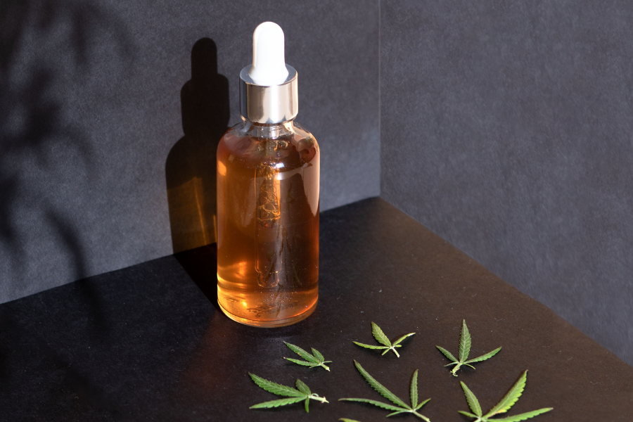 cannabis oil and leaves