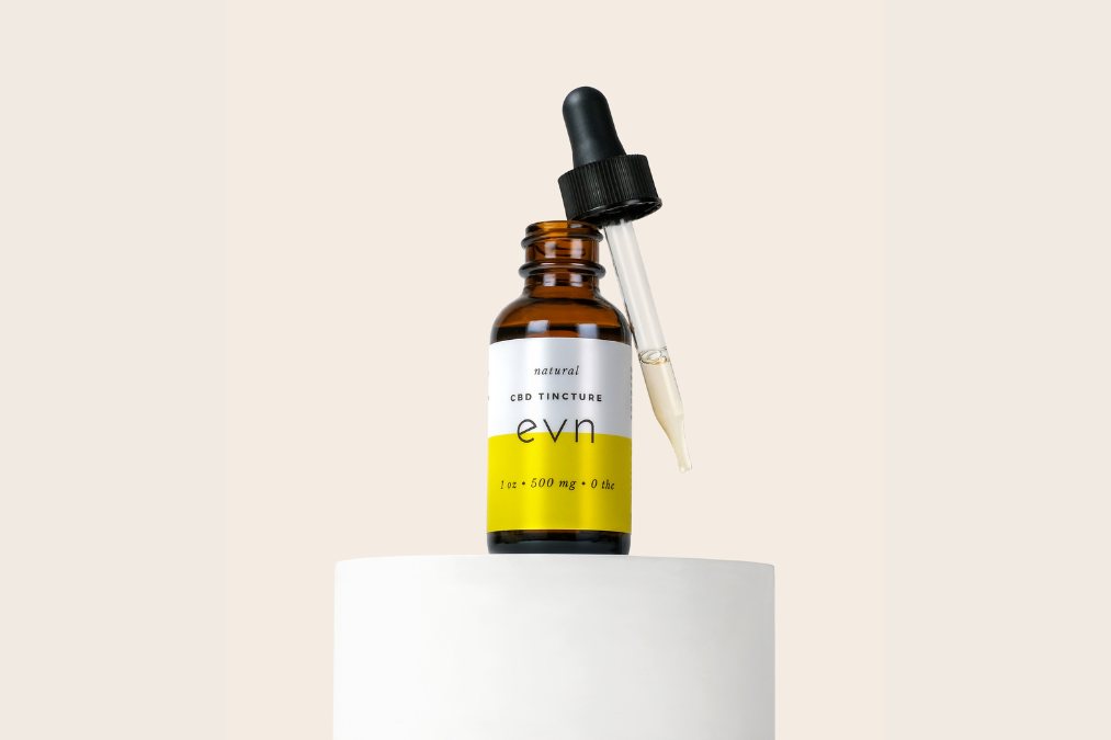 natural cbd oil tincture on a pedestal 