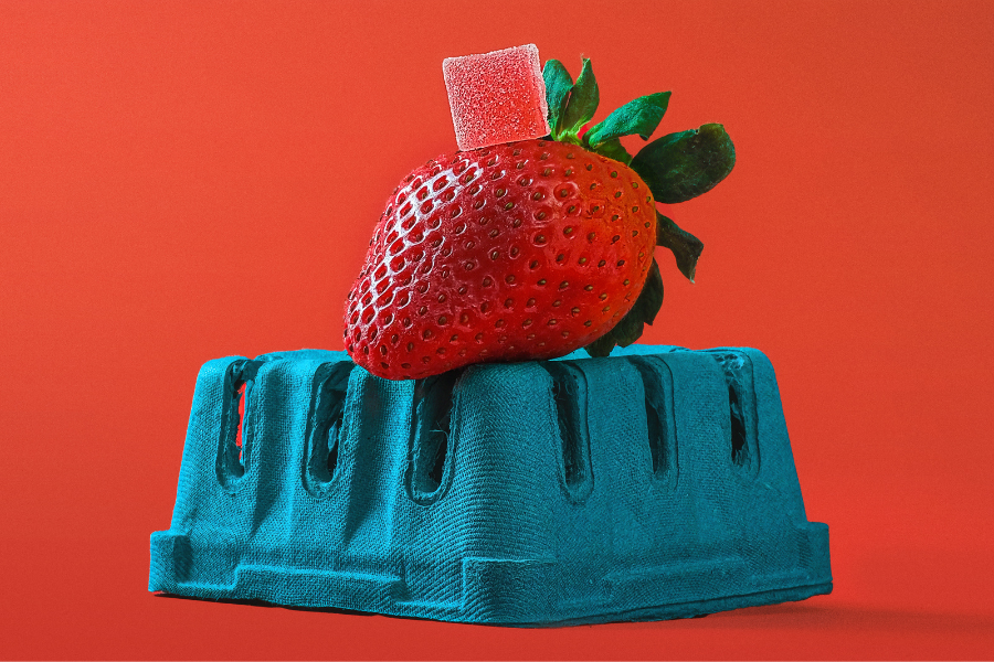 gummy on top of a strawberry