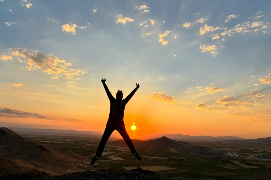 a person jumping for joy
