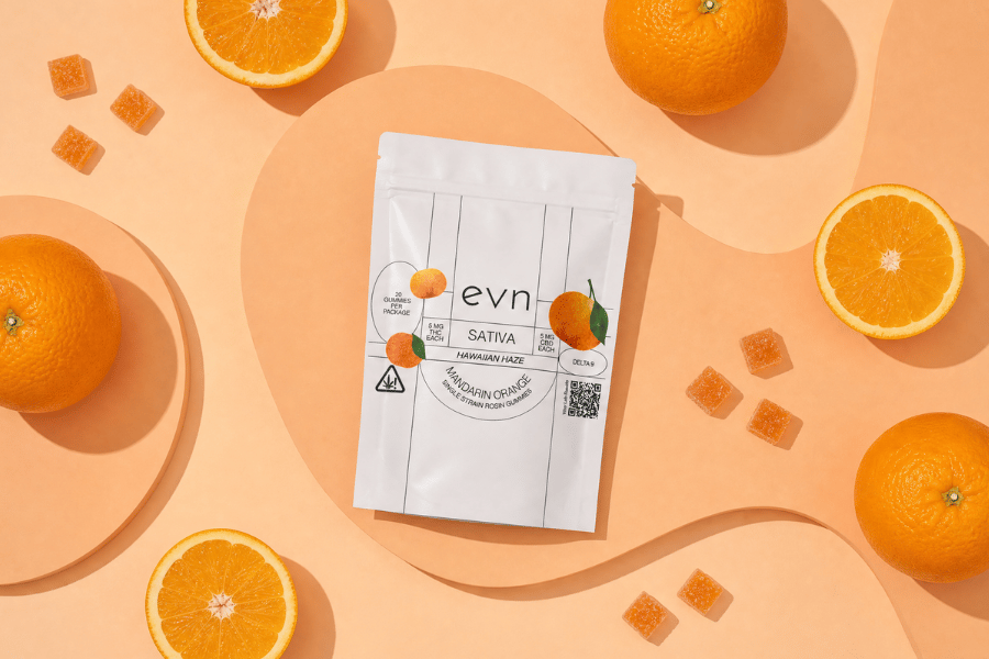 orange mandarin gummies with a pouch in the center