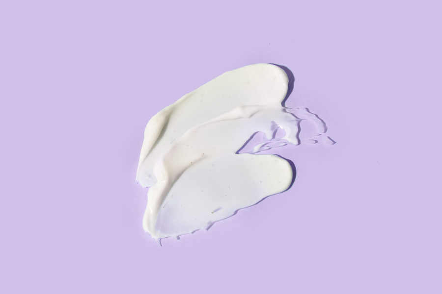 cooling cream on a light purple background
