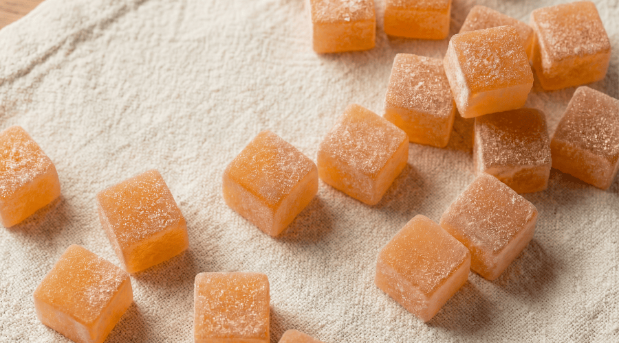 orange gummies on a tablecloth