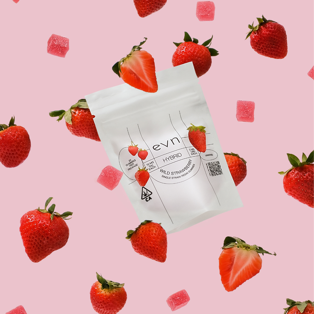 hybrid live resin gummies floating in air with strawberries