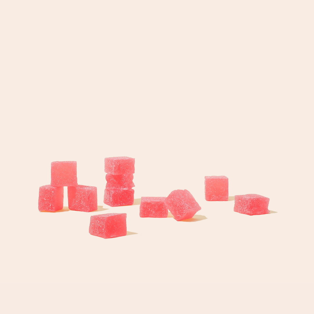 scattered strawberry gummy cubes