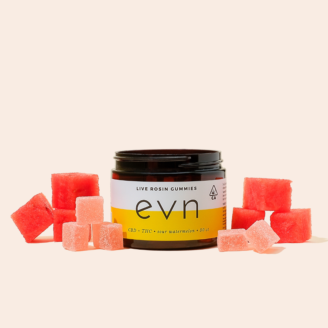 evn gummies with cubes of watermelon next to them